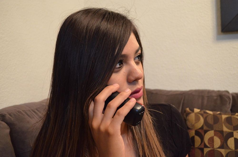 A telephone on a desk ready to take your travel enquiry
